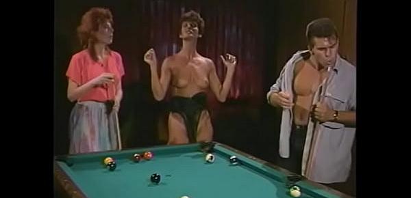  Lusty sturdy guy teaches couple of naughty chicks Sharon Mitchell and Viper to play on the pool table
